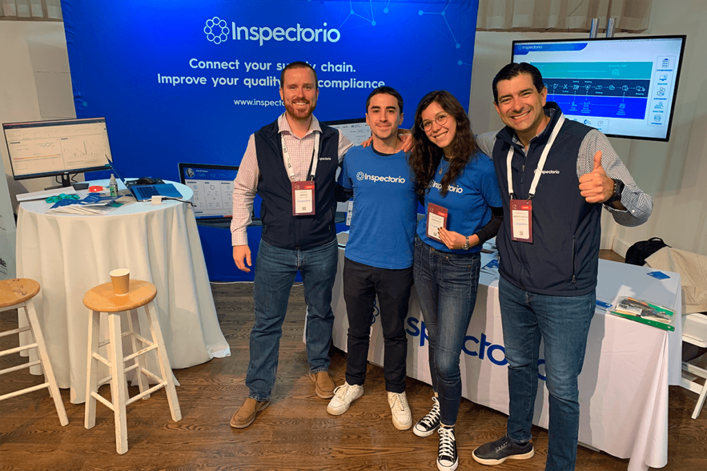 Inspectorio team at an event, promoting supply chain solutions.